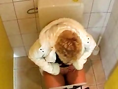Guy fucks a mature in a public bathroom Guy fucks a mature in a public bathroom