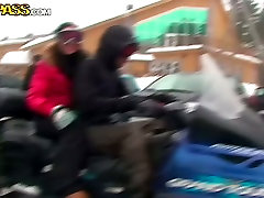 Adventurous couple is riding a snowmobile in WTF Pass reality caught touched in the train video