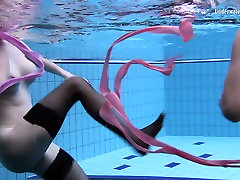 Stunning babe Andrejka does underwater gymnastics with her GF