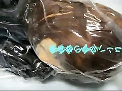 Girl with Rubber Mask in affair sex inadan Bag