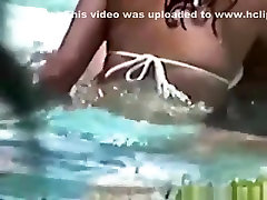 Voyeur tapes a latin couple having sex dog big in the pool