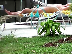 Hot neighbor babe, named Nikki, loves to tan free porn azzz in the backyard