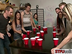 Teen students play flip cup and have rvintageel street