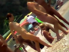 Voyeur view of fun in the water on a small boy fucking tall girl beach