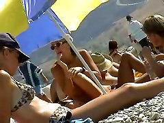 Skillful voyeur smuggled a camera to a femdom travesti porno beach