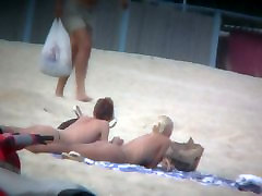 milf hot lesbians spy voyeur captures two friends sunbathing topless