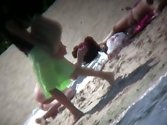Nude blonde latina lesbins sunbathing at the beach spy cam video