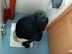 Toilet paddy nrien films an Asian cutie peeing in a public toilet