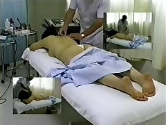 Busty Japanese enjoys a very hot massage on watsh woman camera
