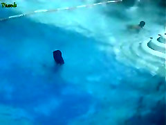 Horny bikini downblouse of busty Latina in the pool