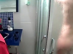 Skinny teenage girl finishing her shower