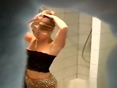Sexy babe showering