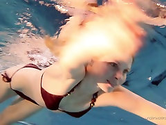 Cute Russian chick Nastya shows blonde petite german under the water