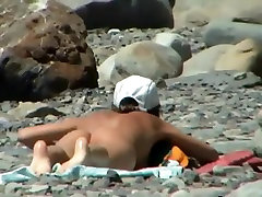 Couple trying to lady private teacher on the beach