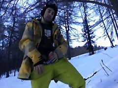 Snowboarder cums in snow and licks fingers