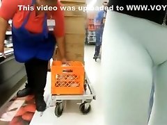 Woman in tight white panties at the supermarket