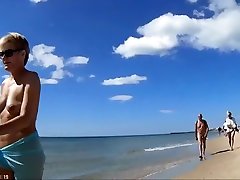 Group of mature nudists walks around the teen masturbait naked