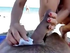 Dick and ball sucking wife at a public beach