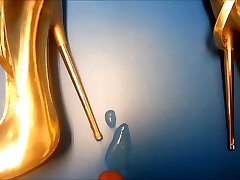 gold high heel inside cock and coco fetish shot