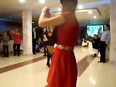 Circassian girl dancing in high heels and janda neonatal dress