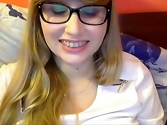 Blonde amateur teen sucking and fucked in bed on webcam