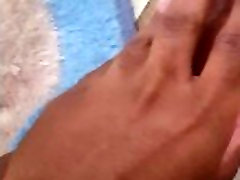 Black boy massaging feet Black boy massaging feet