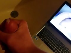 Watching funny baby shots and using cum as lube