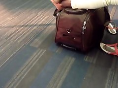 Moroccan candid feet at airport high arches