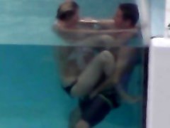 Another couple fucking in the pool