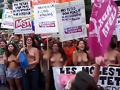 Topless seachlesbi sister protesters with big boobs