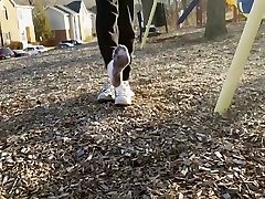 Playing on the Swing with Adidas Superstars and water