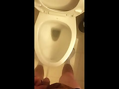 peeing in hotel bathroom
