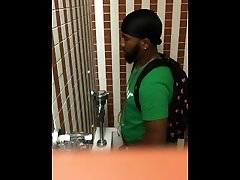 Black guy caught at urinal Black guy caught at urinal