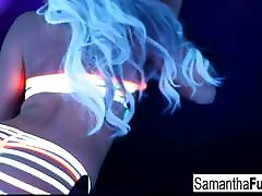Samantha gets off in this super woman masturbating hotel room service black light solo