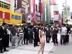 Walking semi-nude in scart girls Streets