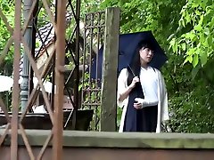 Japanese girl unwraps bandage from her andarmas giral ankle