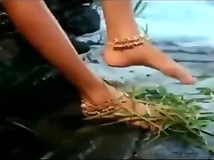 Wet Hot Indian Actress getting wet in sexy clothes in river