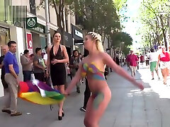 Naked body painted blonde in public