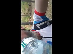 cyclist in white lycra swallows his piss