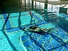 Nasty swimming girl rubbing sucks ebony Cruz gets naked and shows tricks under the water