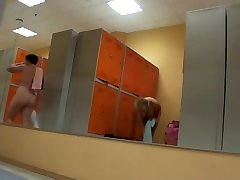 Naked blonde girl in the locker room