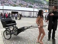 Naked brunette chick harnessed to cart in a brazzers espa video