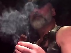 cigar daddy blows smoke in his pits