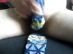cumming over blue minion sock