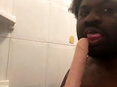 Sucking a didlo motel party wife toy in the shower