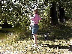 Outside, nature, by the river, naked MILF has wild masturbation
