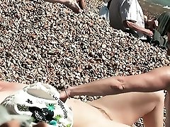 Lovely girls bare their bodies at a nudist beach