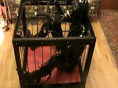 Caged rubberslave - 1