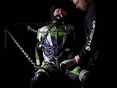 Leather biker tied to chair Leather biker tied to chair
