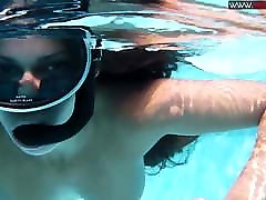 Sexy chick Diana Kalgotkina swims fantastic blonde babe holly in the pool